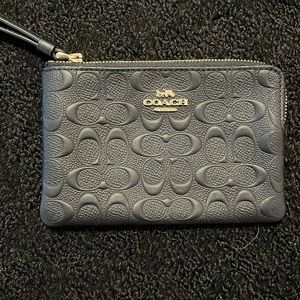 Black and gold embossed coach wrsitlet